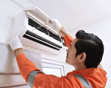 Servicing a wall-mounted air conditioner
